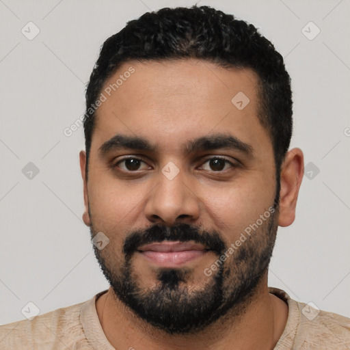 Neutral latino young-adult male with short  black hair and brown eyes