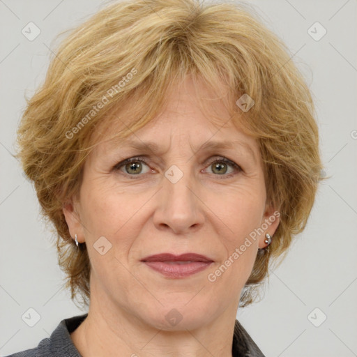 Joyful white adult female with medium  brown hair and blue eyes