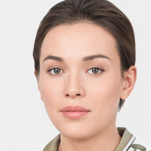 Neutral white young-adult female with short  brown hair and brown eyes