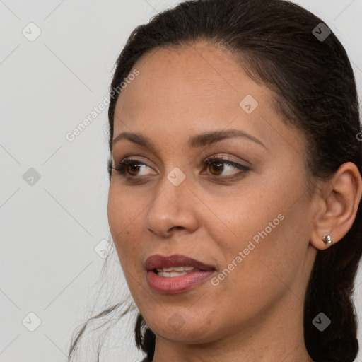 Joyful white young-adult female with long  brown hair and brown eyes