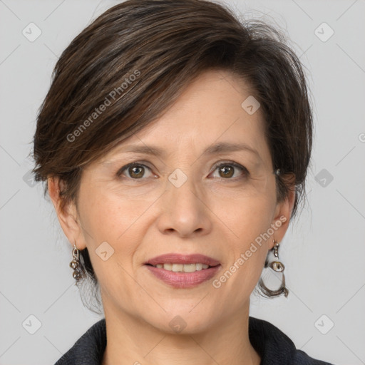 Joyful white adult female with medium  brown hair and grey eyes