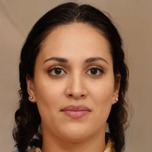 Joyful white young-adult female with medium  brown hair and brown eyes