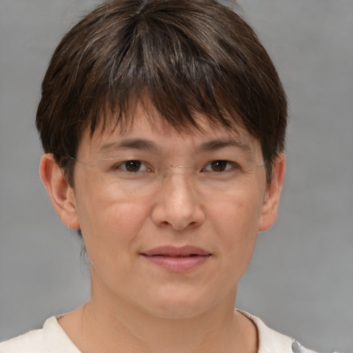 Joyful white adult female with short  brown hair and brown eyes