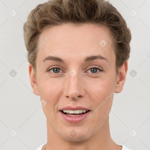 Joyful white young-adult female with short  brown hair and grey eyes