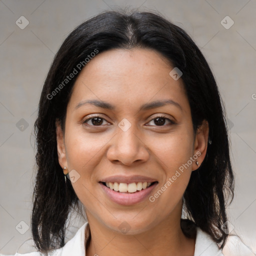 Joyful latino young-adult female with medium  brown hair and brown eyes