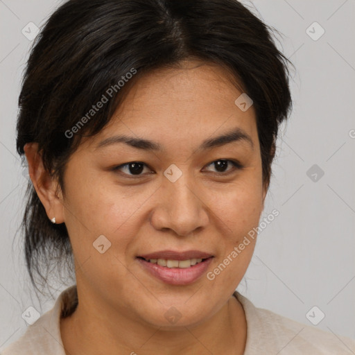 Joyful asian adult female with medium  brown hair and brown eyes