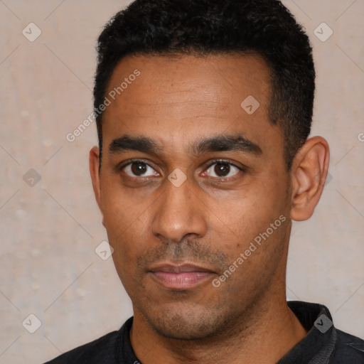 Neutral latino young-adult male with short  black hair and brown eyes