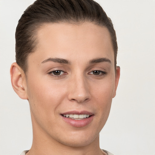 Joyful white young-adult female with short  brown hair and brown eyes