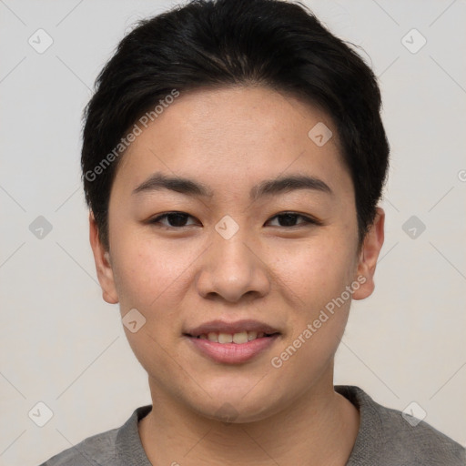 Joyful asian young-adult female with short  brown hair and brown eyes