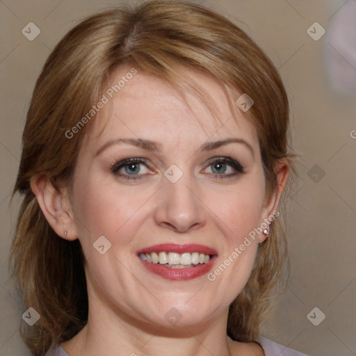 Joyful white adult female with medium  brown hair and grey eyes