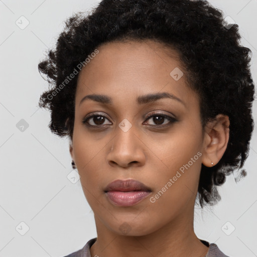 Neutral black young-adult female with short  black hair and brown eyes