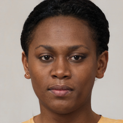 Neutral black young-adult female with short  black hair and brown eyes