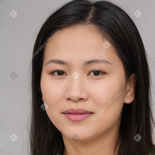 Joyful asian young-adult female with long  brown hair and brown eyes