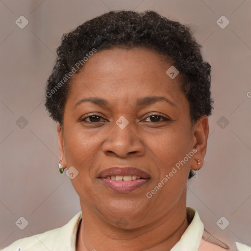 Joyful black adult female with short  brown hair and brown eyes