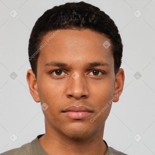 Neutral white young-adult male with short  black hair and brown eyes