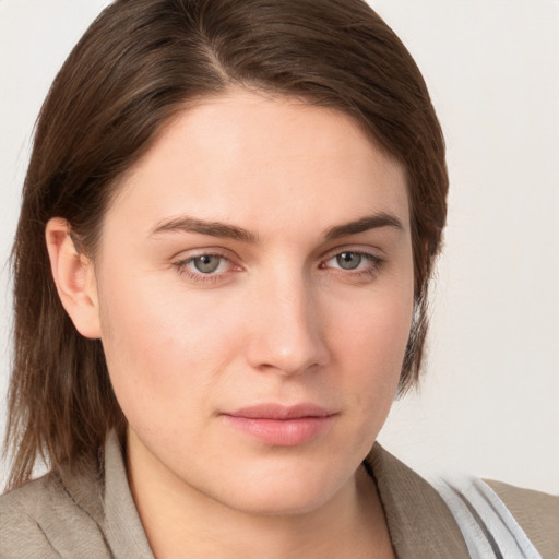 Neutral white young-adult female with medium  brown hair and grey eyes