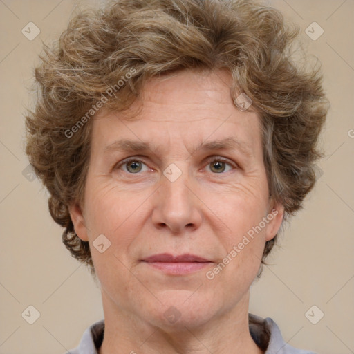 Joyful white middle-aged male with short  brown hair and grey eyes