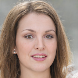 Joyful white young-adult female with medium  brown hair and green eyes