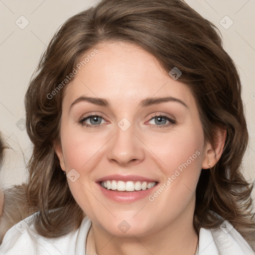 Joyful white young-adult female with medium  brown hair and green eyes