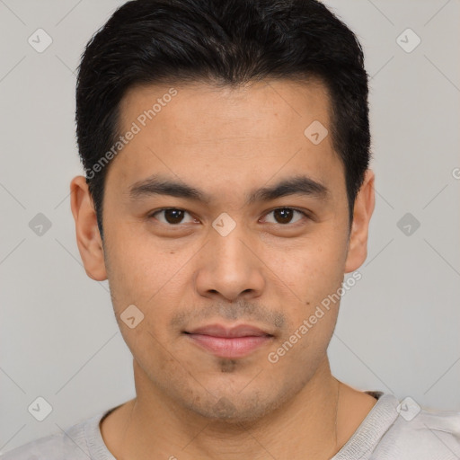 Joyful asian young-adult male with short  black hair and brown eyes