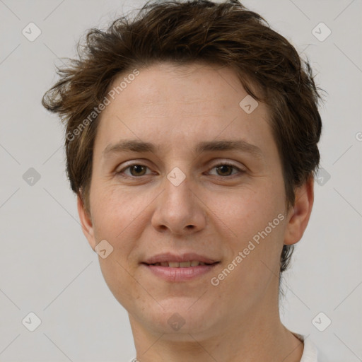 Joyful white adult female with short  brown hair and brown eyes