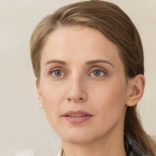 Neutral white young-adult female with medium  brown hair and grey eyes