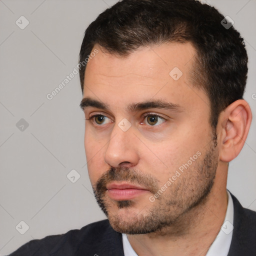 Neutral white young-adult male with short  black hair and brown eyes