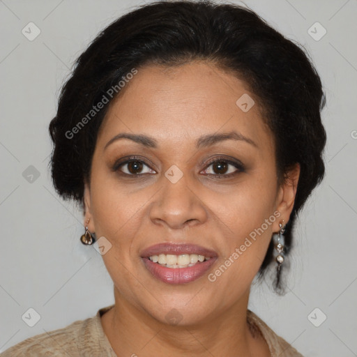 Joyful latino adult female with medium  brown hair and brown eyes