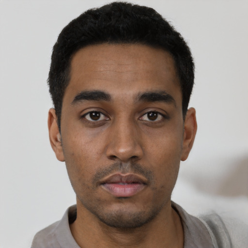 Neutral black young-adult male with short  black hair and brown eyes