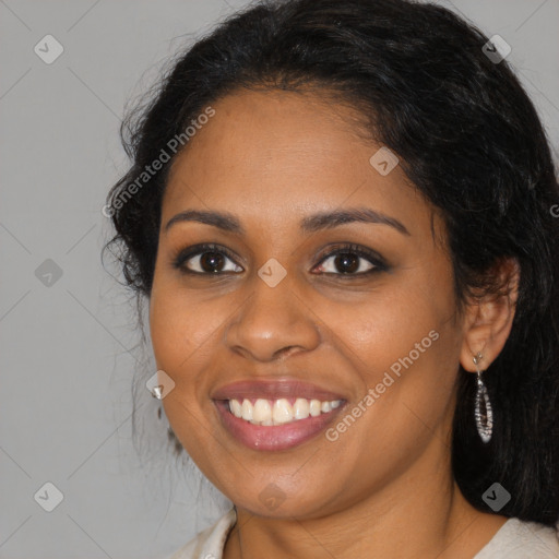 Joyful black young-adult female with medium  black hair and brown eyes