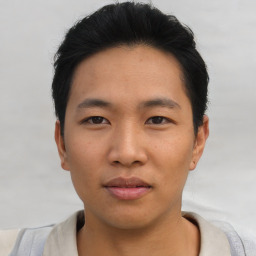 Neutral asian young-adult male with short  black hair and brown eyes