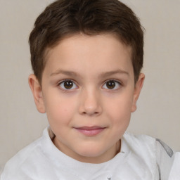 Joyful white child female with short  brown hair and brown eyes