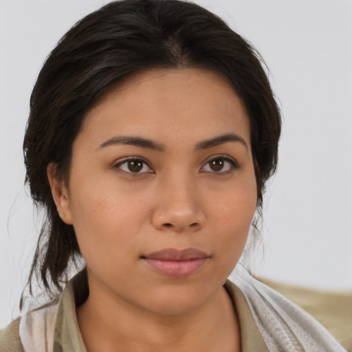 Neutral asian young-adult female with medium  brown hair and brown eyes