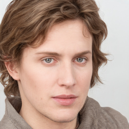 Neutral white young-adult male with medium  brown hair and blue eyes