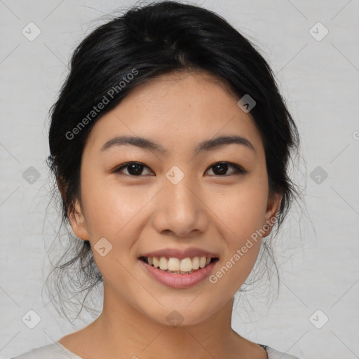 Joyful asian young-adult female with medium  black hair and brown eyes