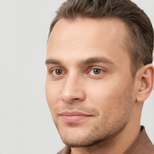 Neutral white young-adult male with short  brown hair and brown eyes