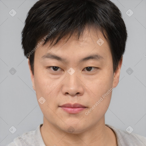 Neutral asian young-adult male with short  brown hair and brown eyes