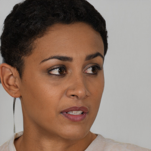 Neutral black young-adult female with short  brown hair and brown eyes