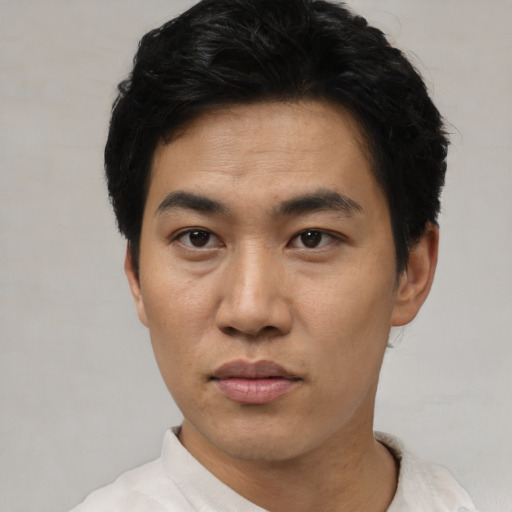 Neutral asian young-adult male with short  black hair and brown eyes