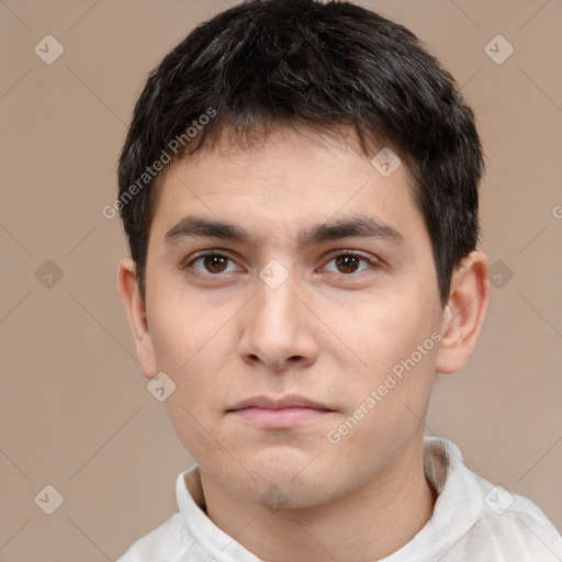 Neutral white young-adult male with short  black hair and brown eyes