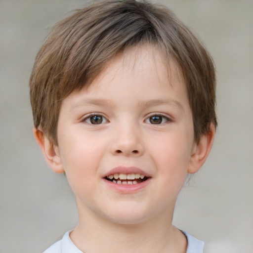 Joyful white child female with short  brown hair and brown eyes