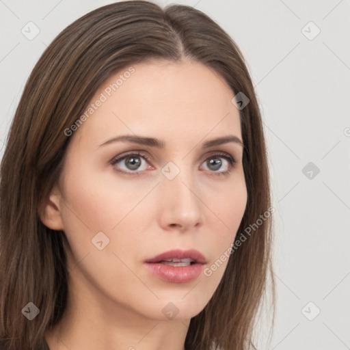 Neutral white young-adult female with long  brown hair and brown eyes