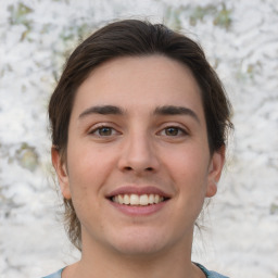 Joyful white young-adult male with medium  brown hair and brown eyes