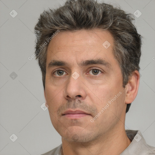 Neutral white adult male with short  brown hair and brown eyes