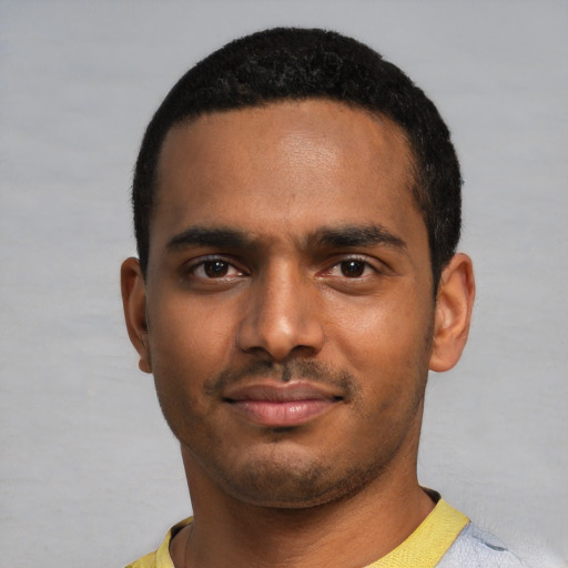 Neutral black young-adult male with short  black hair and brown eyes
