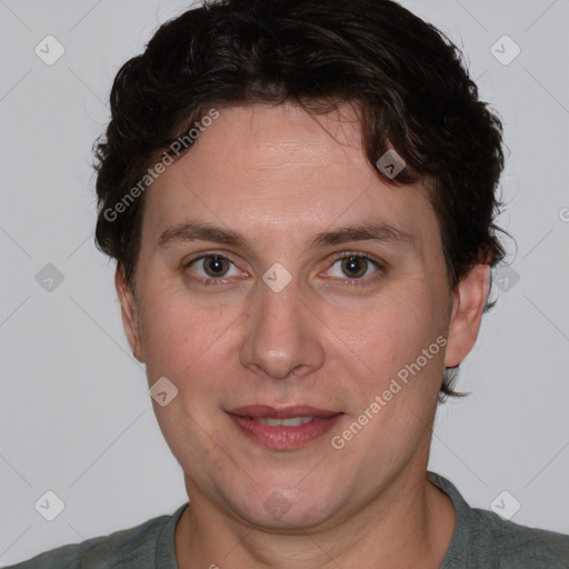 Joyful white adult female with short  brown hair and brown eyes