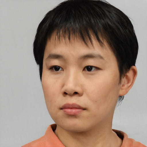 Neutral asian young-adult female with short  brown hair and brown eyes