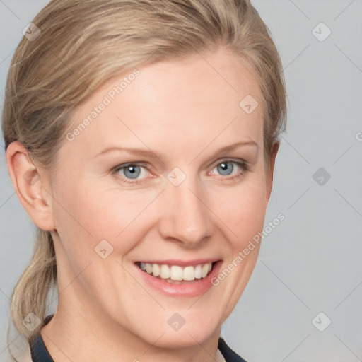 Joyful white young-adult female with medium  brown hair and blue eyes