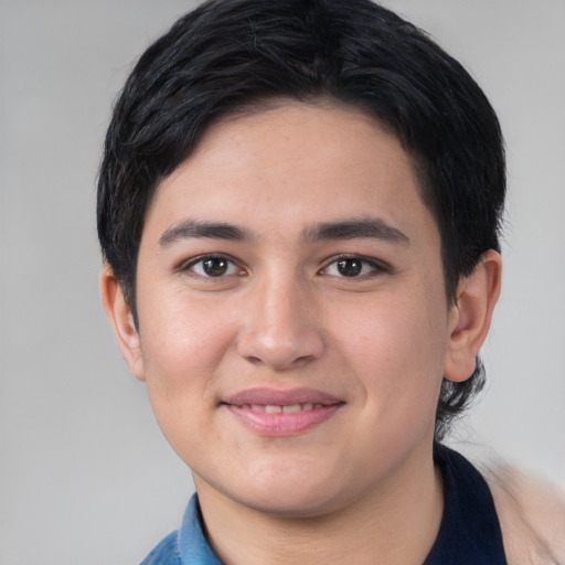Joyful white young-adult male with short  black hair and brown eyes