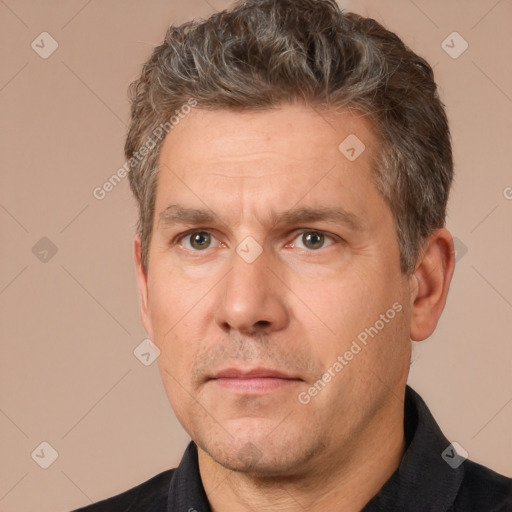 Neutral white adult male with short  brown hair and brown eyes